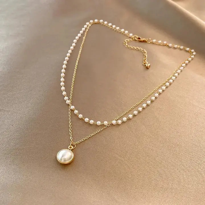PAOLA | Collar Colgante de Perla Dorada